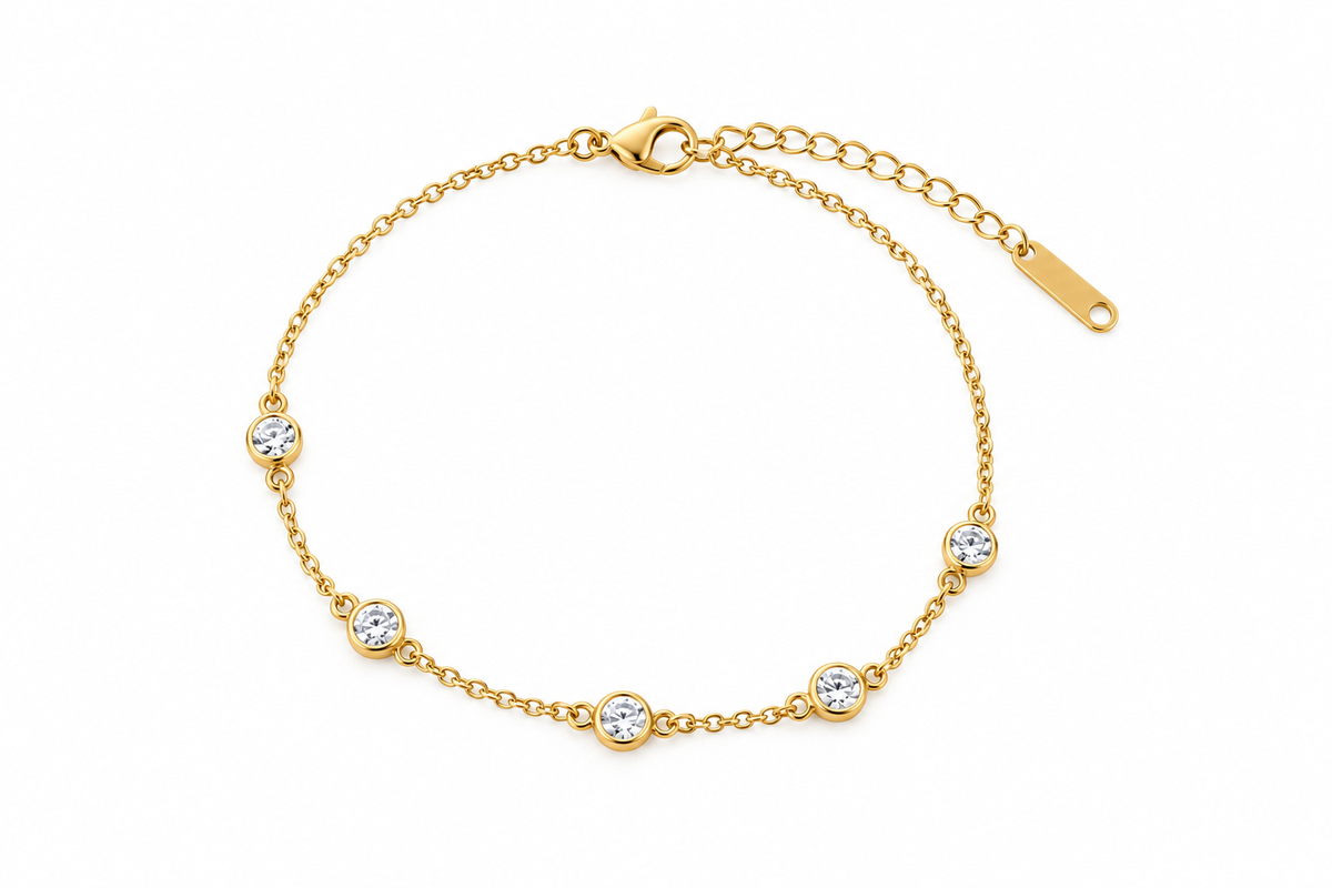 Gold zircon station bracelet in stainless steel