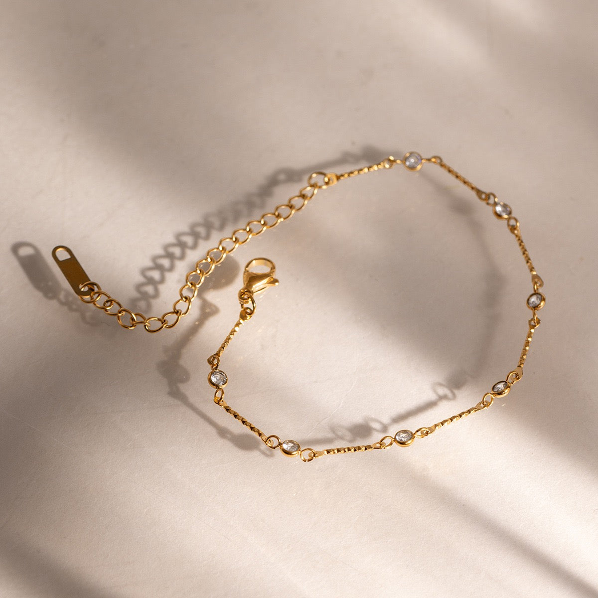 Close-up of zircon details on a stainless steel bracelet