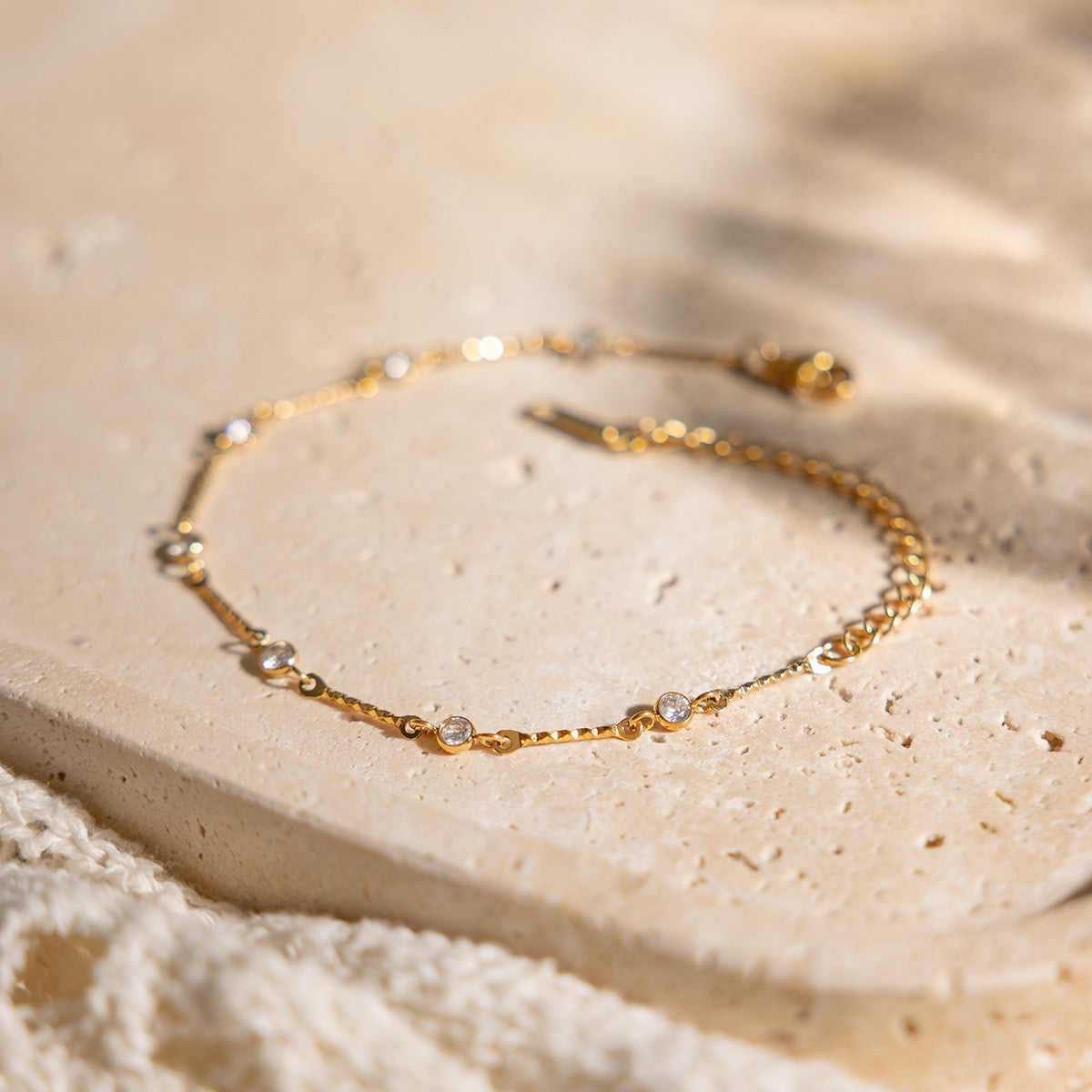 Close-up of zircon details on a stainless steel bracelet