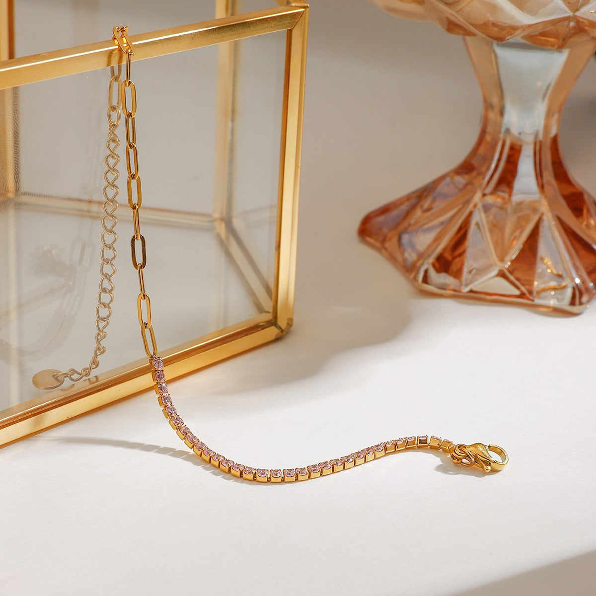Close-up of zircon details on a gold stainless steel bracelet