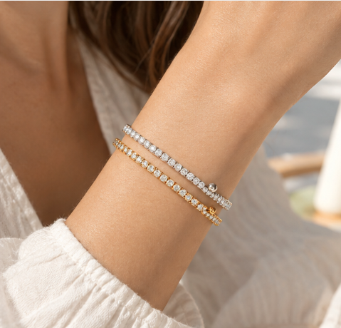Woman wearing a delicate zircon tennis bracelet